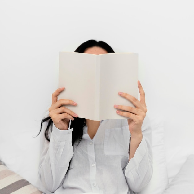 Woman reading a book alone