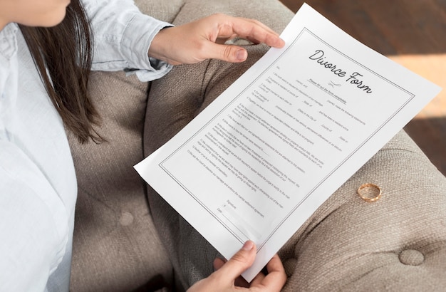 Woman reading divorce form