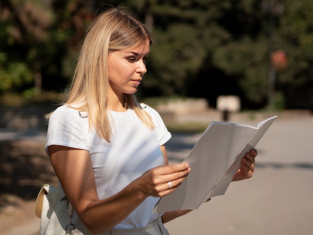 Woman reading a mock-up magazine