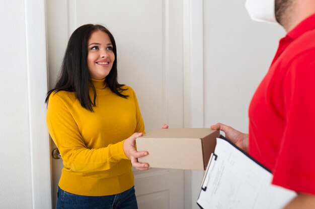 Woman receiving her new cyber monday purchase