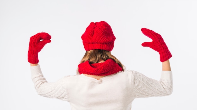 Free photo woman in red cap with glove puppets