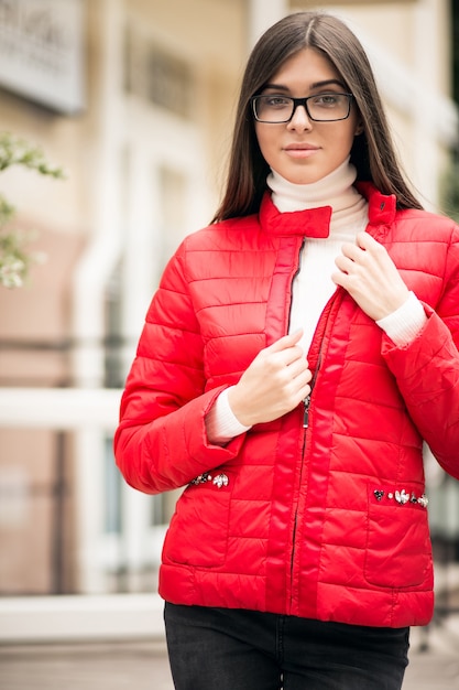 Free photo woman in a red jacket