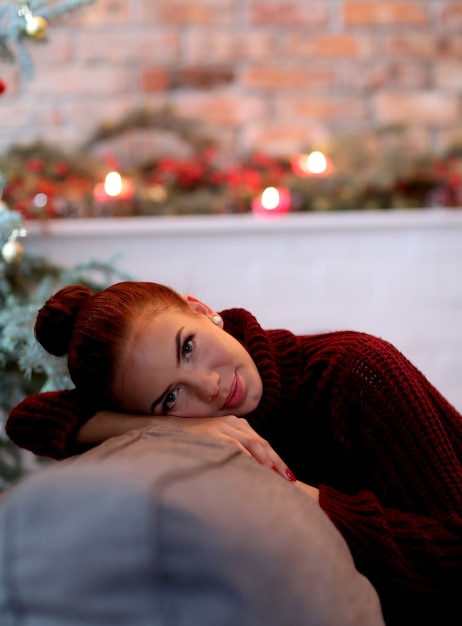 Woman in red sweater