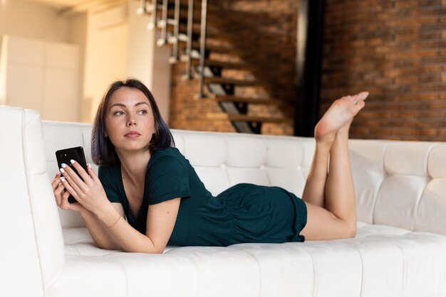 Woman relaxing alone at home