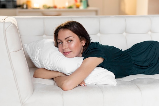 Free Photo woman relaxing alone at home