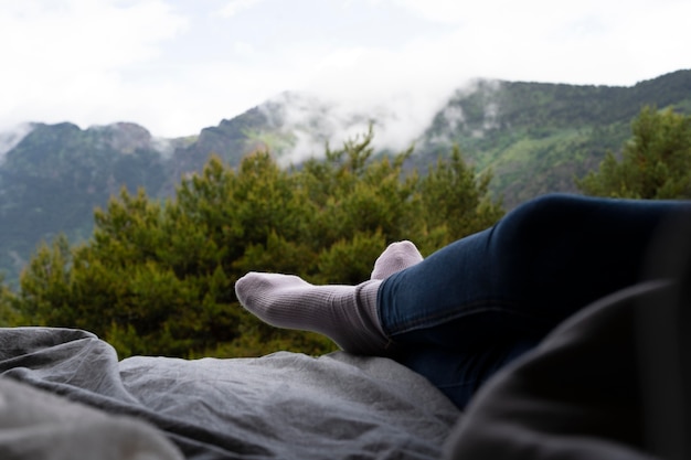 Free photo woman relaxing in her camper in daylight