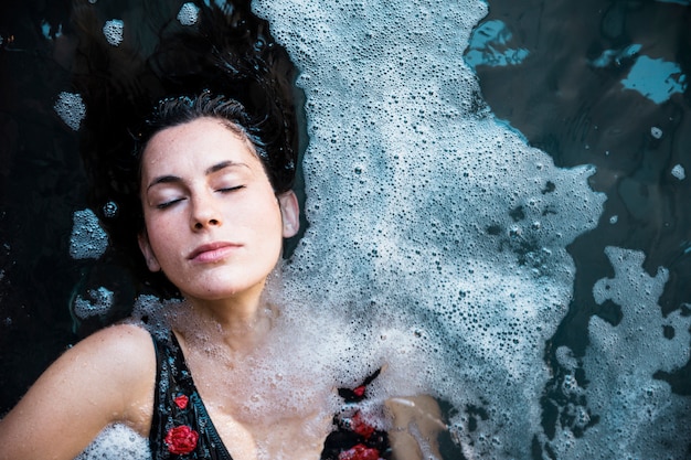 Woman relaxing in spa