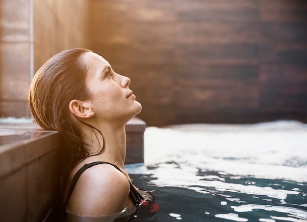 Woman relaxing in spa