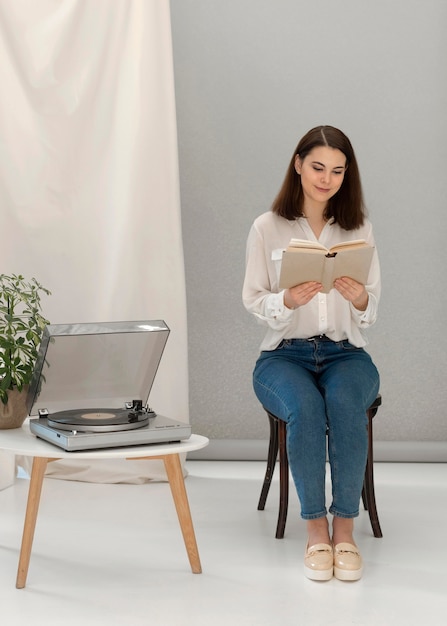 Woman relaxing while reading book