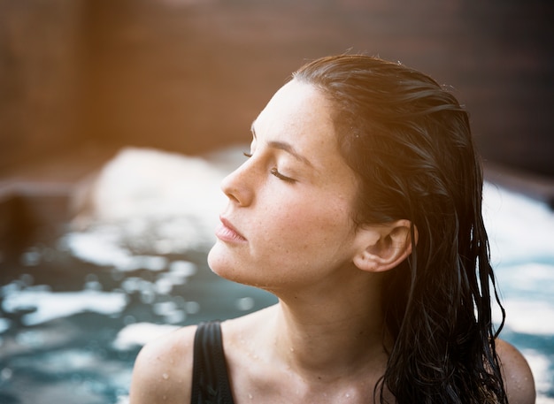 Free Photo woman relaxing in whirlpool