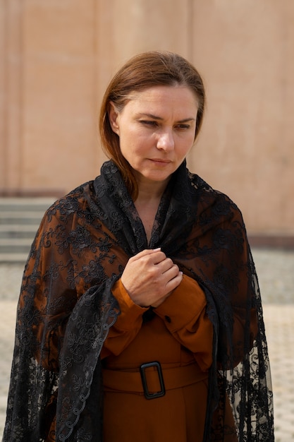 Free Photo woman during religious pilgrimage at the church