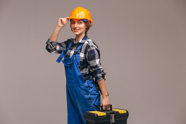 Woman repairer in uniform with tool box