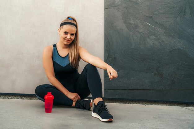 Woman resting in sportswear