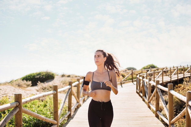 Woman running at beach