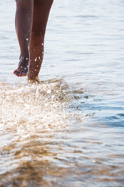 Free Photo woman running in water