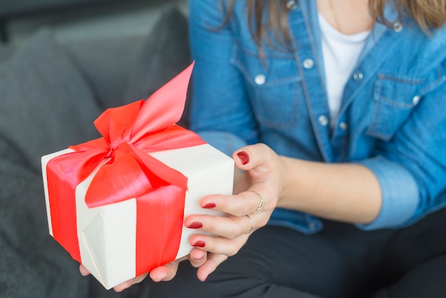 Free Photo woman's hand holding gift