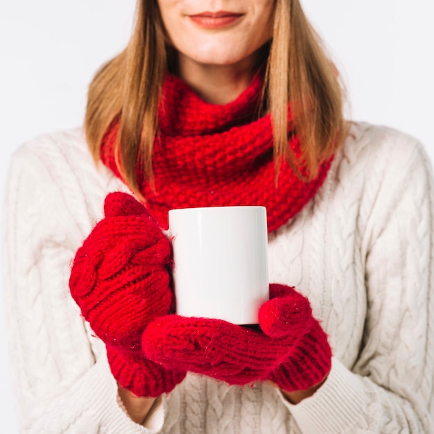 Free Photo woman in scarf holding cup