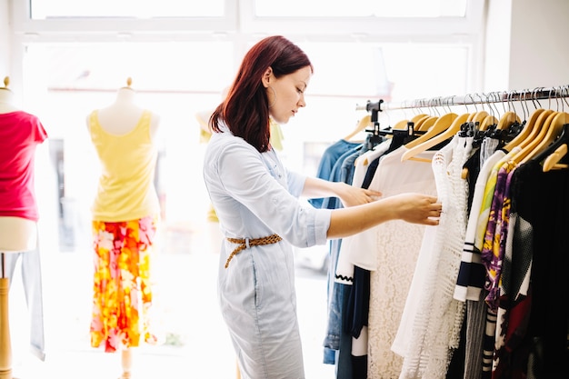 Woman searching for new clothes