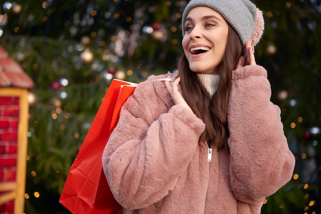 Woman during shopping on Christas market