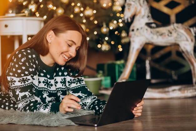 Woman shopping online on Christmas sales