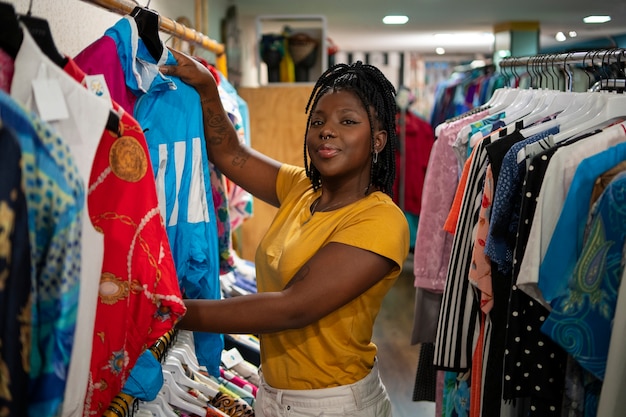 Woman shopping in thrift store