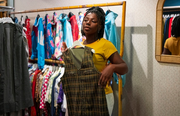 Woman shopping in thrift store