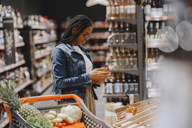 Woman shopping vegetables at the supermarket