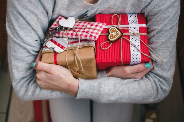 Woman showing her gift boxes