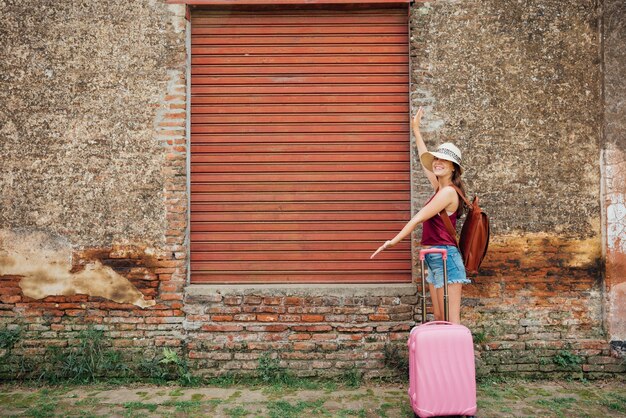 Woman showing loading dock gate