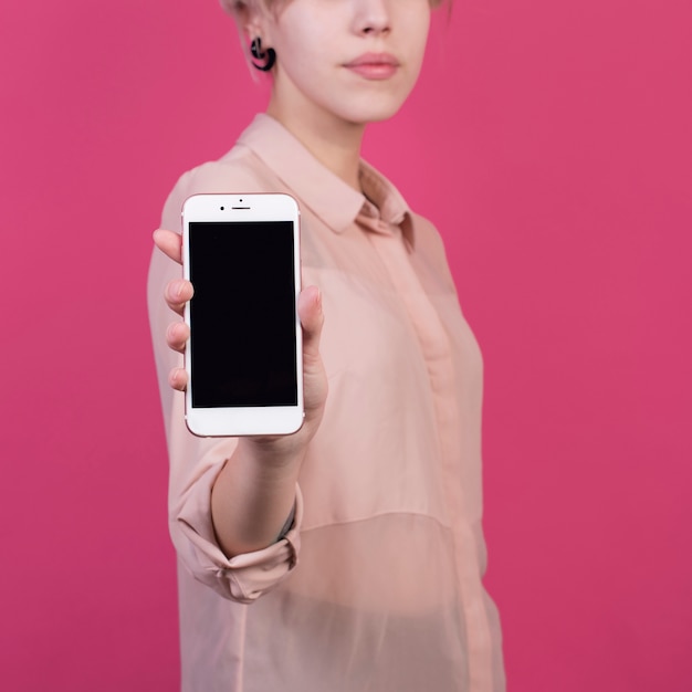 Free photo woman showing smartphone template