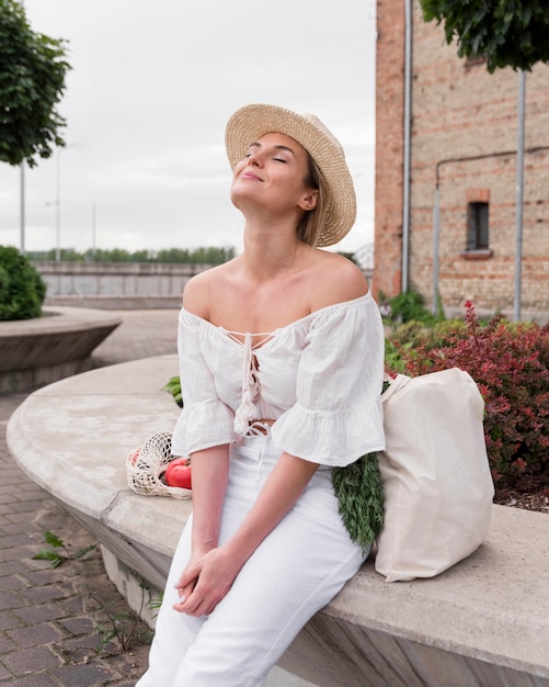 Woman sitting and enjoying the sun