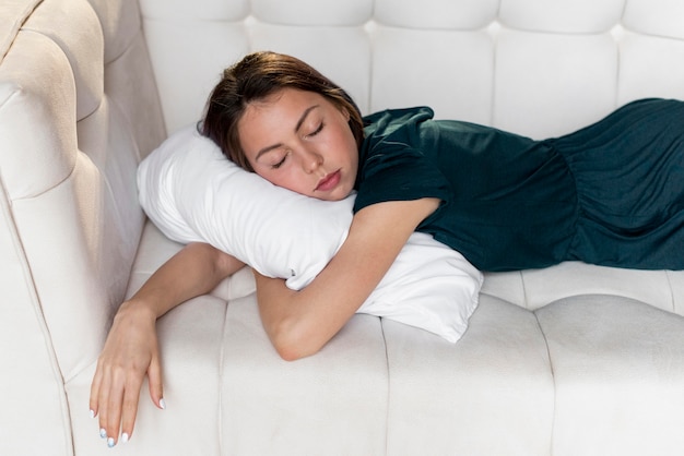 Woman sleeping on the couch