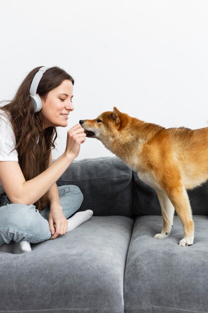 Free photo woman spending time together with her dog