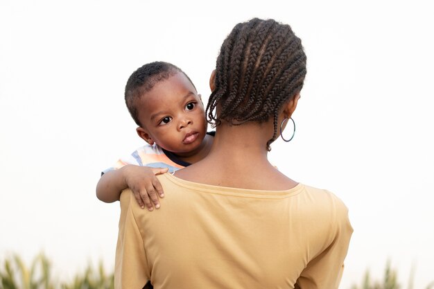 Woman spending time with her black baby boy