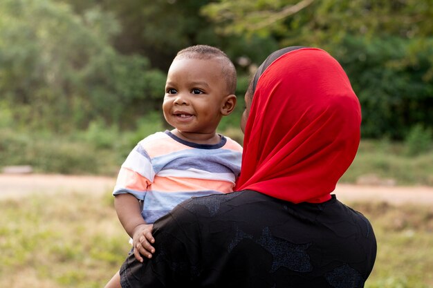 Woman spending time with her black baby boy