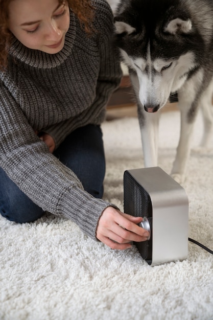 Free Photo woman spending time with her pet