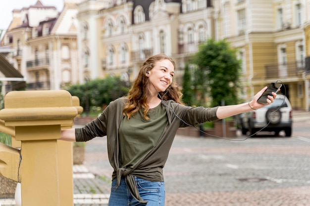 Woman on streets dancing