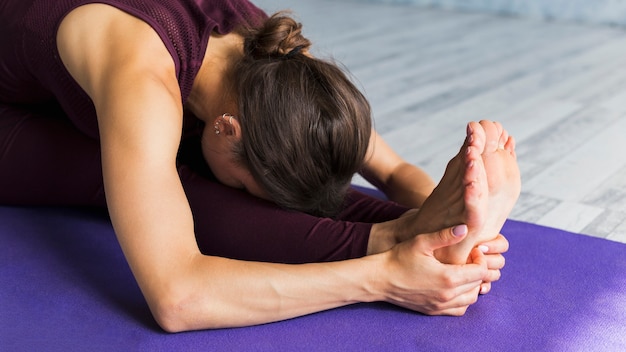 Woman stretching her legs