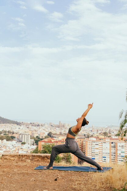 Woman stretching and practising yoga