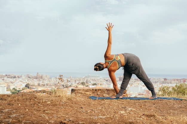 Woman stretching with yoga exercises