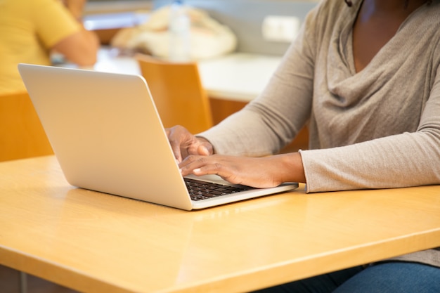 Free photo woman student working in computer class