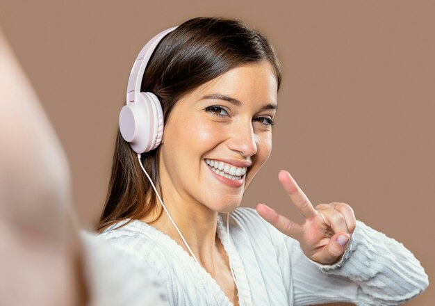 Woman in studio listening to music