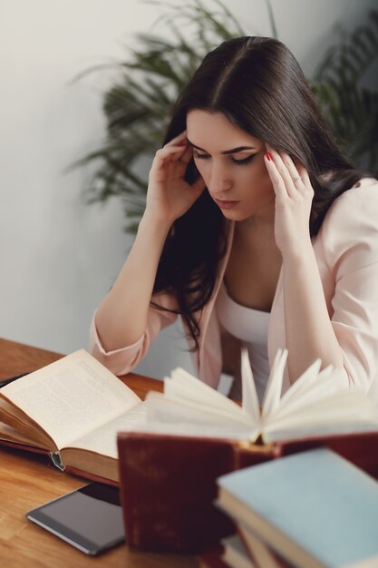 Woman studying at the library