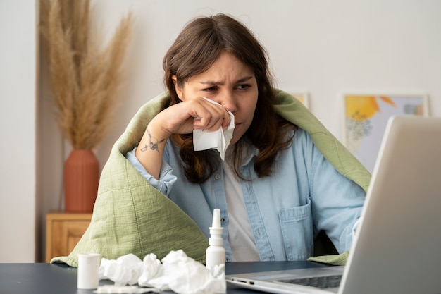 Free Photo woman suffering from allergies medium shot