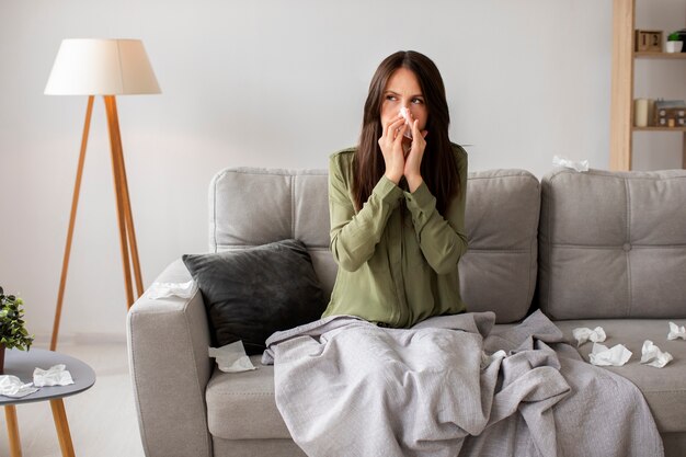 Woman suffering from allergy front view