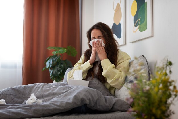 Woman suffering from flower allergy