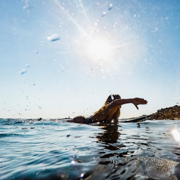 Free photo woman swimming in water