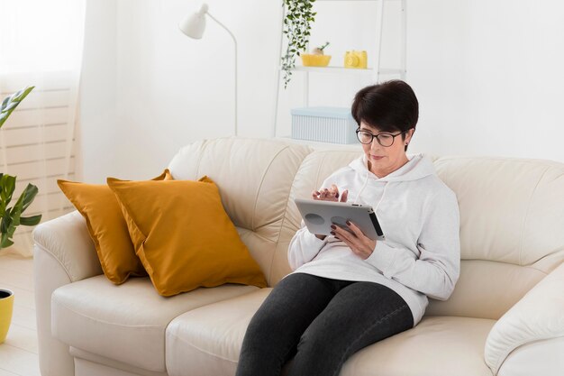 Woman on tablet at home