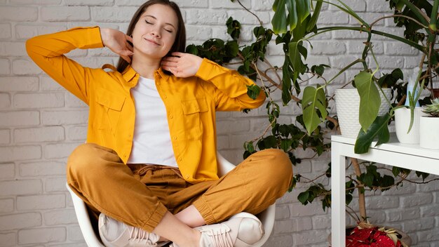 Woman taking a break from gardening