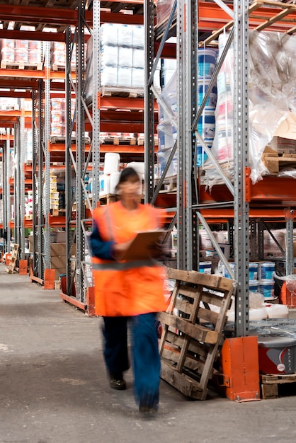 Woman taking care of warehouse logistics